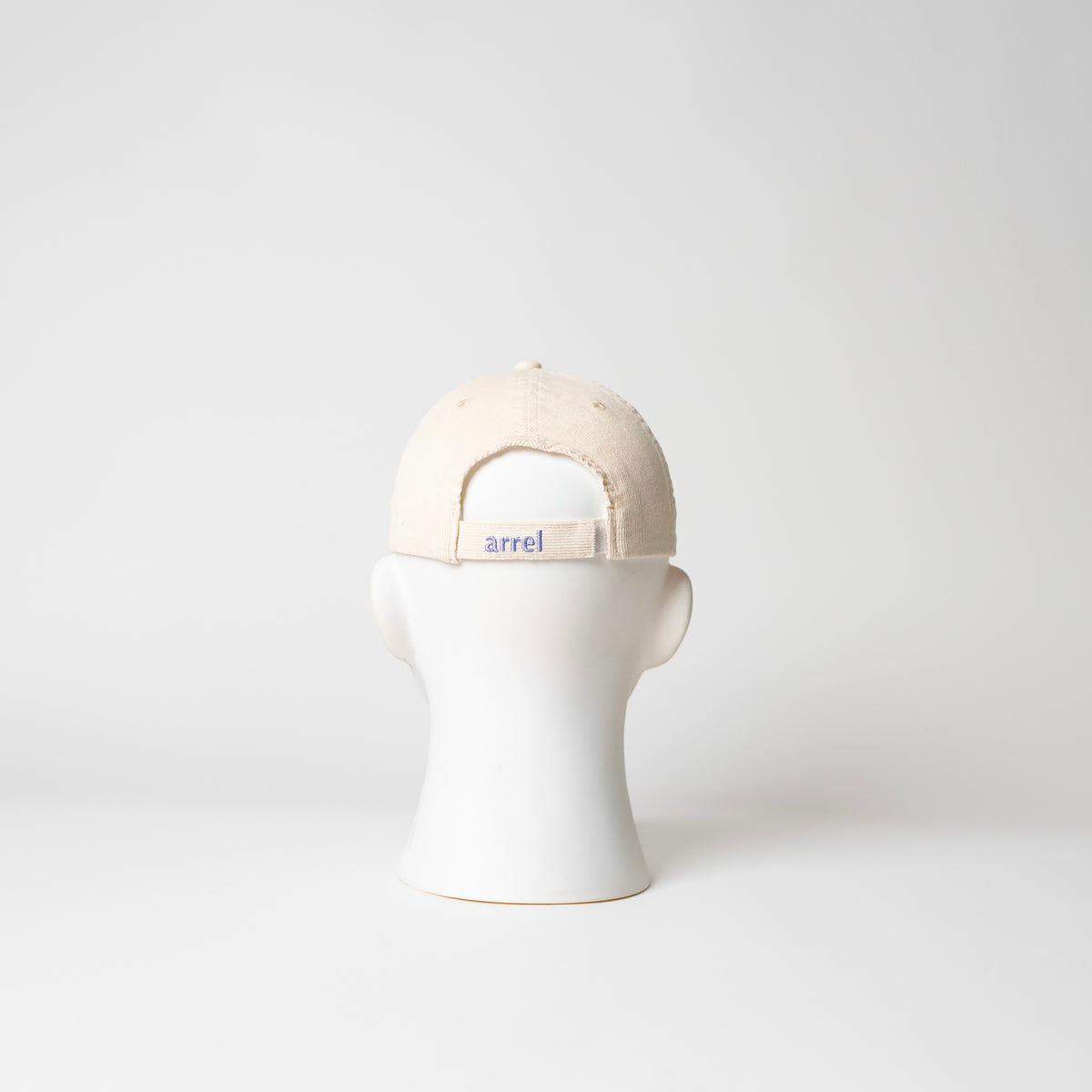 arrel Kappe “Don’t Be a Racist” Beige/Lavendel | Klare Botschaft | arrel