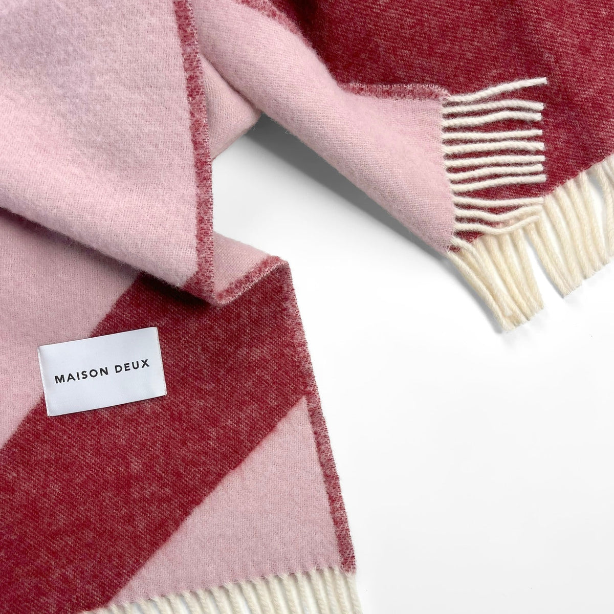 Maison Deux Decke “Swirl” Rosa Bordeaux | 100% Wolle | Maison Deux